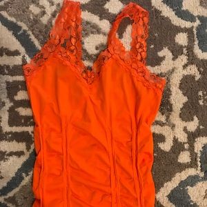 M U.S.A form fitting orange tank top
